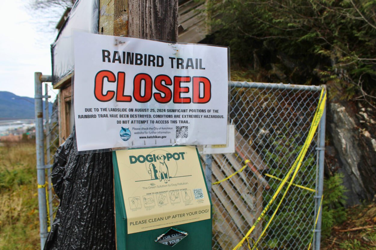 a closeup of a sign that reads "Rainbird Trail Closed" "Due to the landslide on August 25, 2024 significant portions of the Rainbird Trail have been destroyed. Conditions are extremely hazardous. Do not attempt to access this trail."